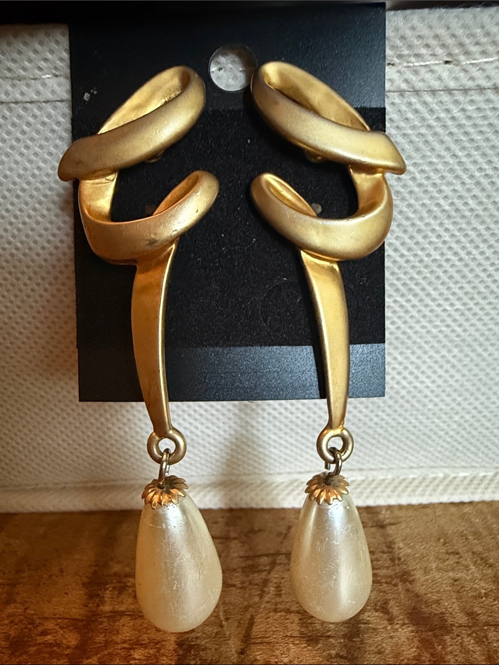 Gold Tone Twisted Drop Earrings with Cream Pearl Teardrops